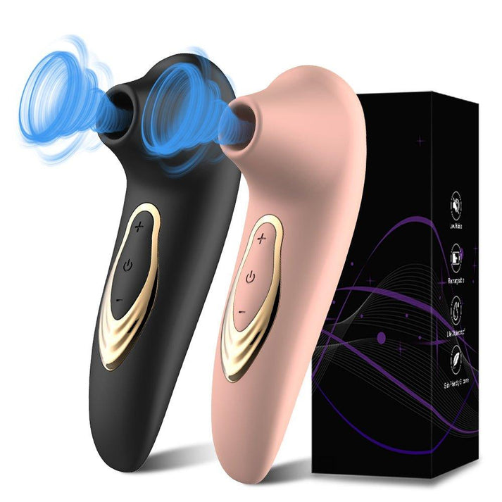 Compact handheld clitoral vibrator with contoured tip