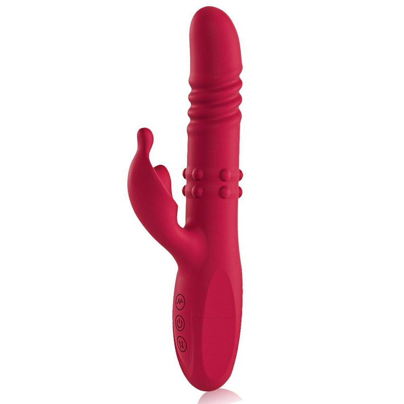 Rabbit-style vibrator with a thrusting rotating shaft and a clitoral stimulator