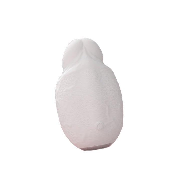 Rounded liquid silicone vibrator with swinging tip