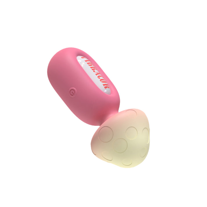 Silicone vibrator with flexible spring-mounted mushroom head