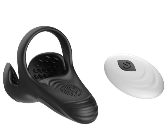 Cock ring with attached egg-shaped stroker sleeve