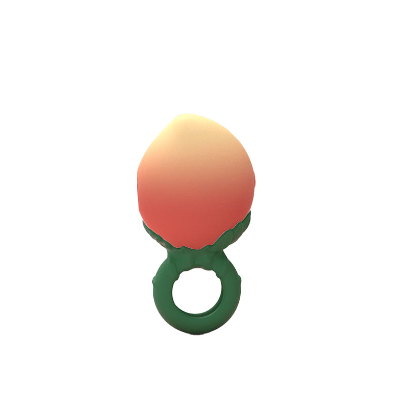 Silicone vibrating cock ring with peach-shaped partner stimulator