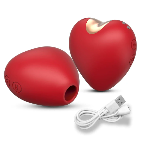 Heart-shaped sucking jumping egg — red heart clitoral suction vibrator with USB charging cable (product set image)