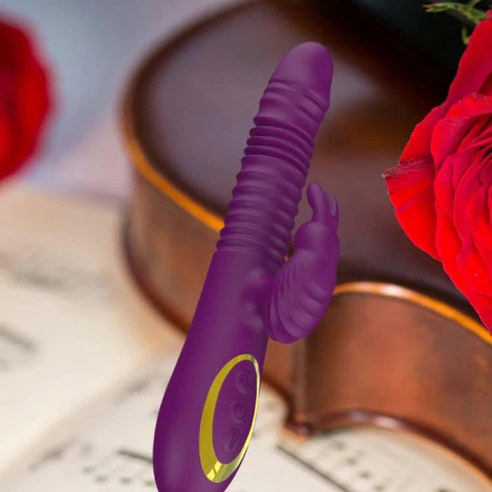 Rabbit vibrator with retractable internal shaft and clitoral arm