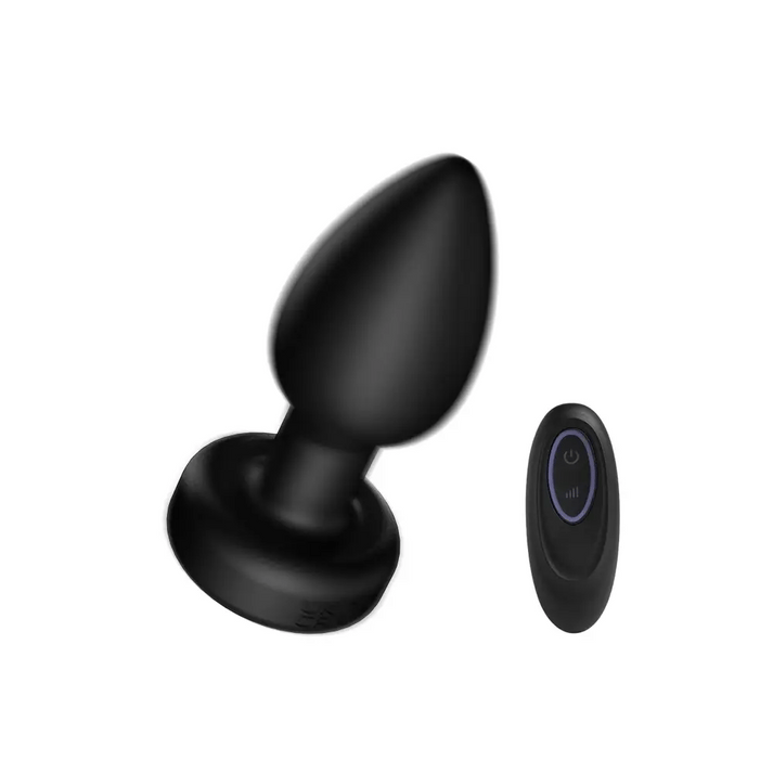 Tapered silicone vibrating butt plug with flared light-up LED base and wireless remote
