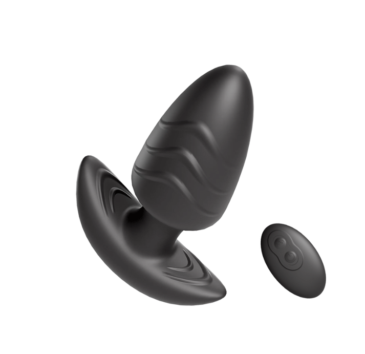 Rotating anal plug with tapered tip and flared base