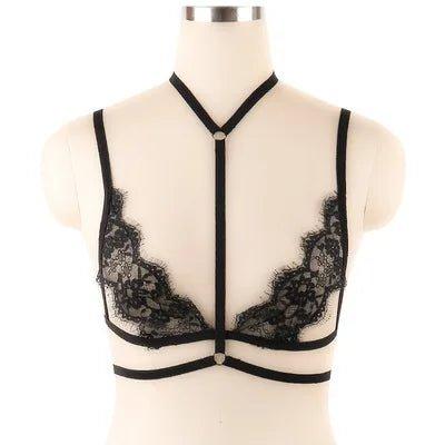 Lace bandage bra and garter belt set laid flat for full display
