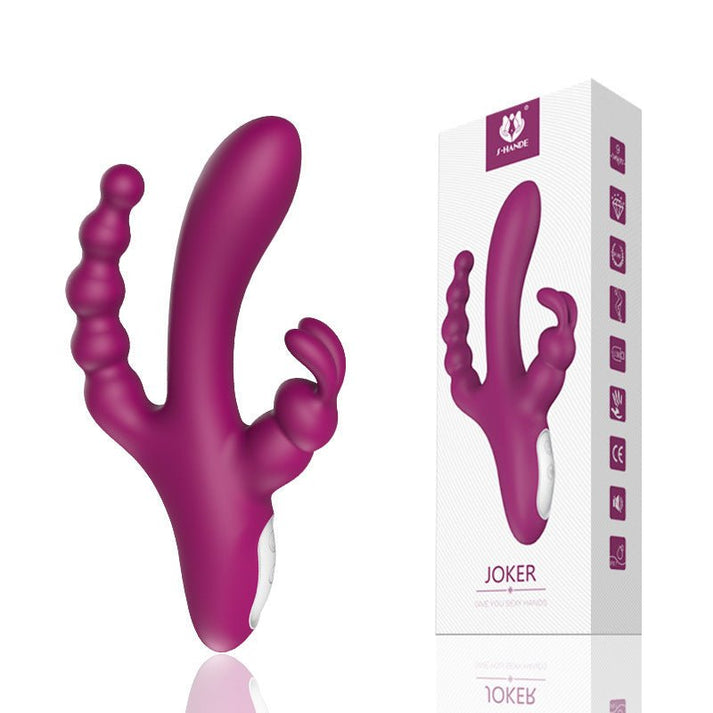 Silicone rabbit vibrator with G-spot shaft, clitoral arm and attached anal bead strand